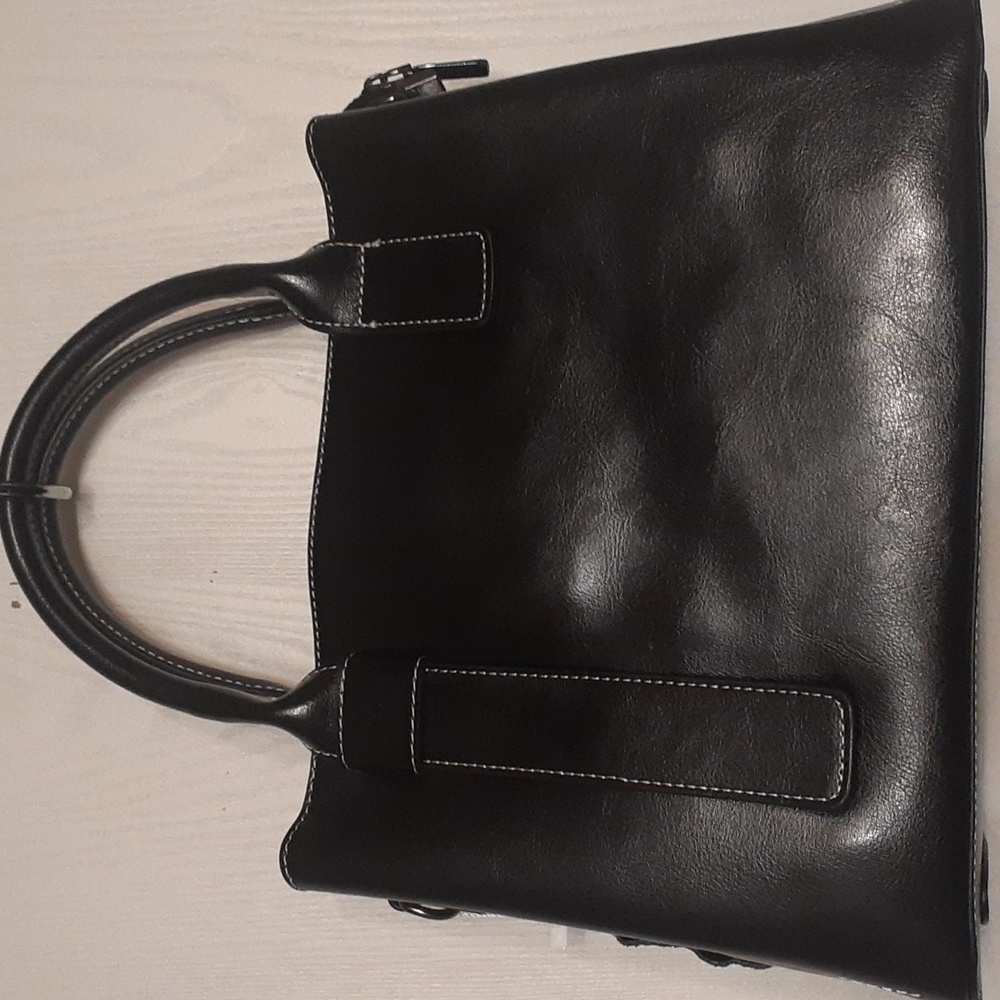 Black leather crossbody bag with long shoulder straps.